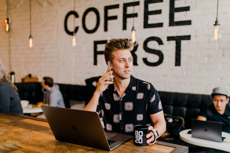 This is a photo of an entrepreneur at a coffee shop on their laptop. Here are 7 things every new business own should know.